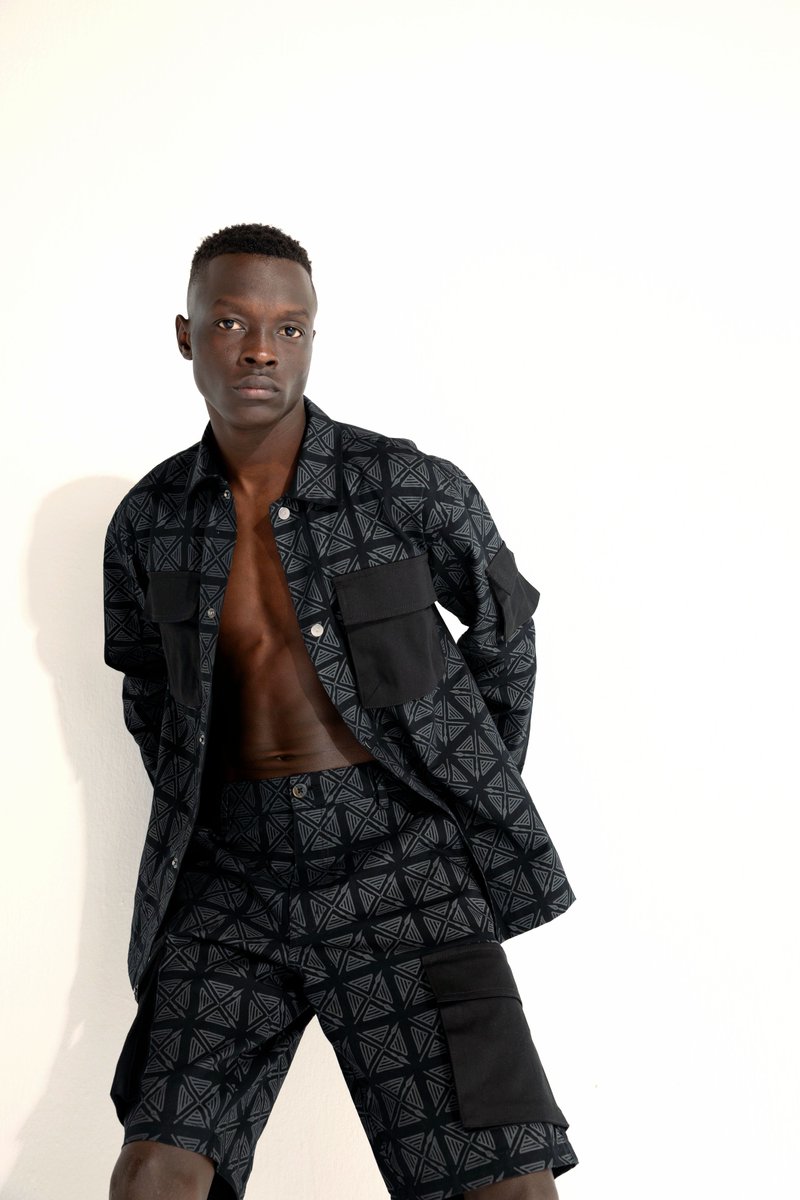 KiddHunta's tweet photo. Introducing our Cargo Suit with a Matching Shirt and Shorts – a distinctive ensemble that showcases an all-over print spear shield repeating pattern. Celebrate a continent rich in artefacts with this unique cargo set. 

https://t.co/ExC4ydcdl5

#streetwear #denim #streetfashion https://t.co/apUvDouNLs