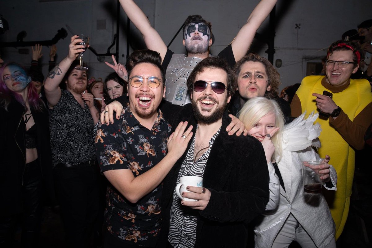 JonDBarker's tweet photo. Lil throwback to one of the most chaotic series of pictures from NYE 2019-20, and @MMikeDeann &amp; @RayRoberts_ leading a crowd surfing moment on the stroke of midnight https://t.co/H43NDP5xbF