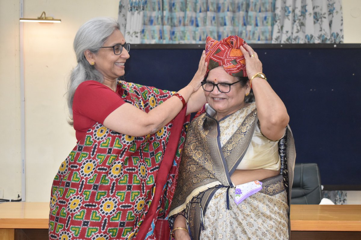 IncomeTaxRaj's tweet photo. In a tribute that transcends norms, Ms. Aina Mathur, NS being presented with a Safa (a symbol of pride &amp; respect &amp; worn by men) on her retirement by Ms. Irina Garg, PCCIT, Rajasthan in Jaipur. IT Dept bids farewell to Ms. Mathur as she retires after a remarkable tenure. https://t.co/eUzuz2B75a