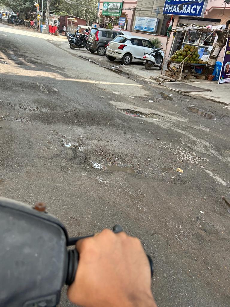 poojadapa's tweet photo. Probably the worst road in Hyderabad with massive potholes, giving hard time to riders. What is the Govt doing with the road taxes ? @revanth_anumula @GadwalvijayaTRS @CommissionrGHMC @hydcitypolice @narendramodi https://t.co/97ymufJJfg