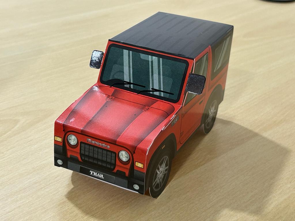 mirchibites's tweet photo. @anandmahindra @soonitara Dear Anandji and Sooniji - never fear, a specially packaged Thar is on its way for Cheeku to enjoy! This is a custom design by https://t.co/TsXa7PhlC2 filled with delicious chocolates sent as a gesture of good will. https://t.co/6ugNKKSccn