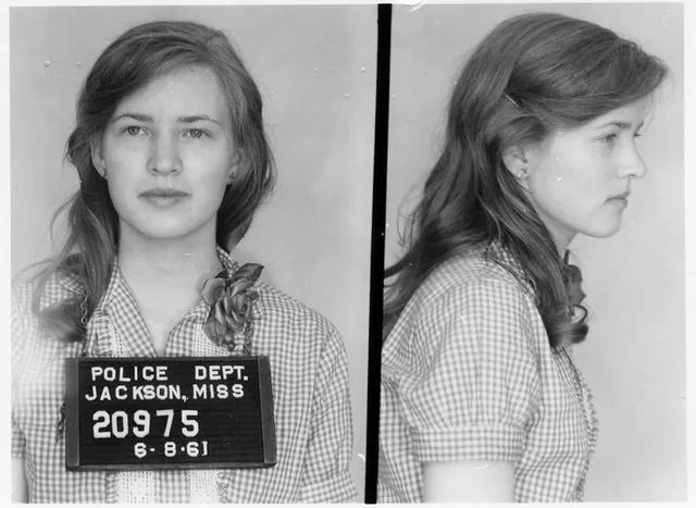 fasc1nate's tweet photo. Woman arrested for protesting segregation. 1960's https://t.co/HFnniRHzLF