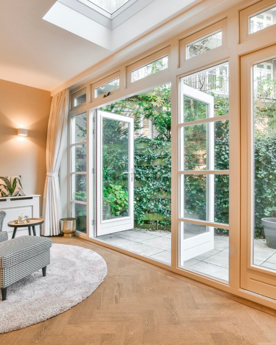 There's nothing prettier in a home than a window wall. We love this unique combination of French doors, side lights, & transom windows. It adds so much light and style to this room.

Stop by our showroom in Chelsea to design your window wall.

#windowwall #bhamal