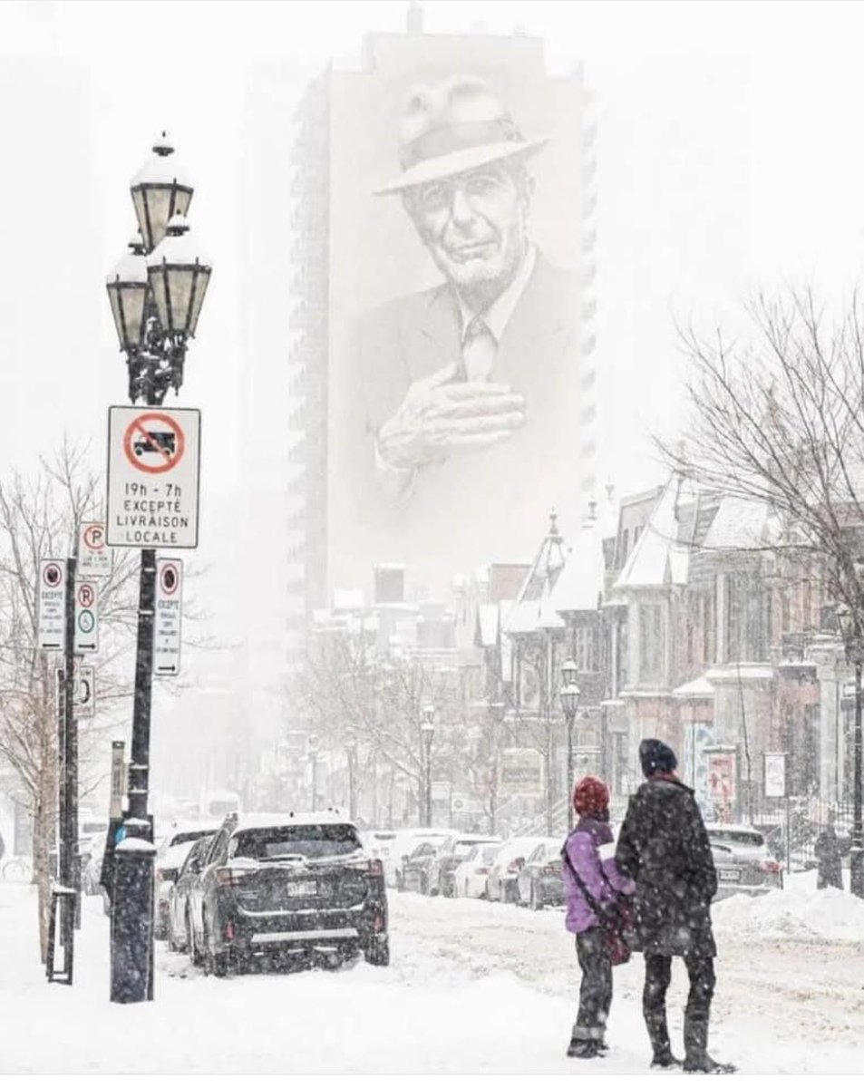 The beauty of Montreal. Snow and Leonard Cohen seemingly looking down on his beloved city from the Heavens. Miss my hometown.