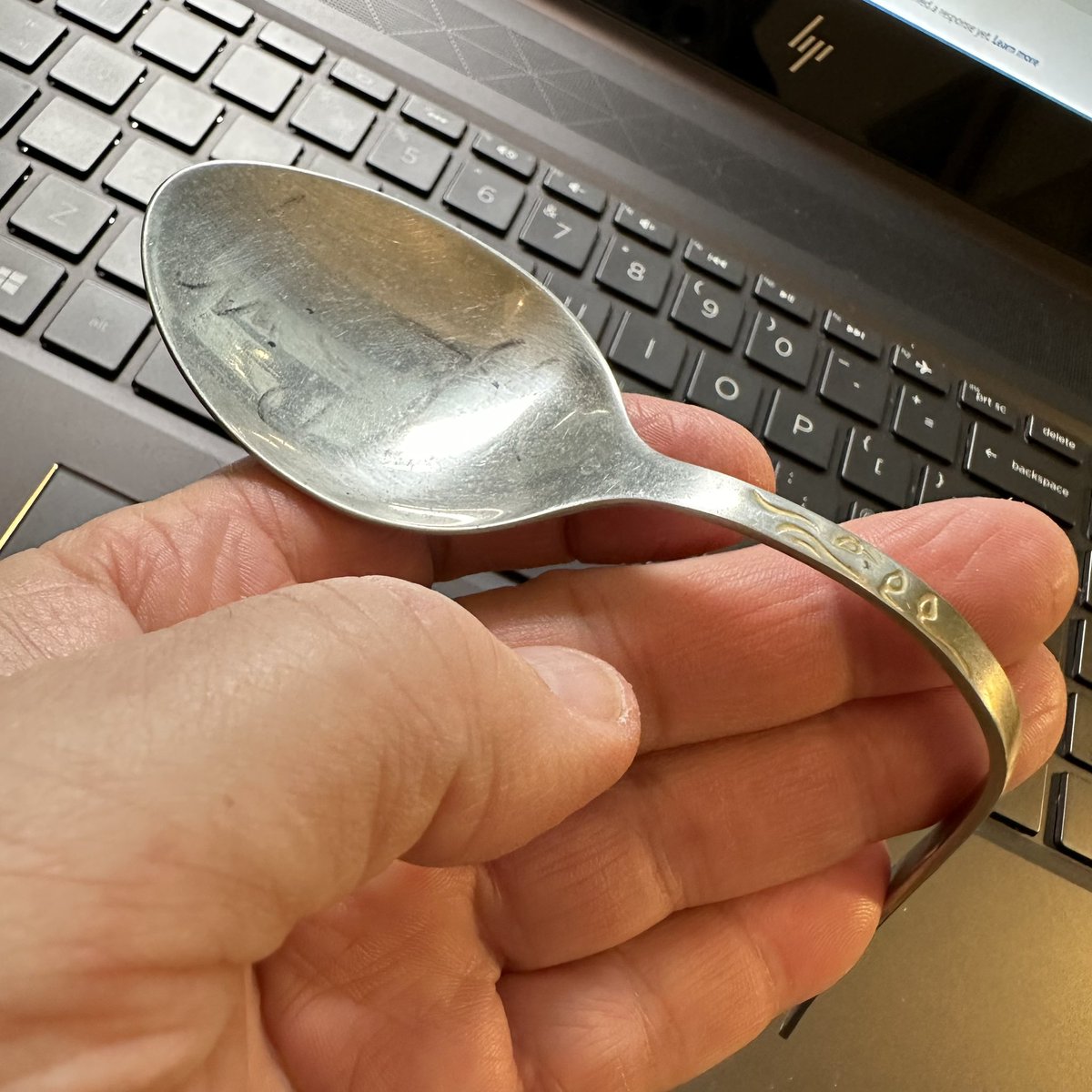 MrTimHunt's tweet photo. @theurigeller took this spoon from his drawer, bent it &amp; signed it when I visited him in his beautiful home in Sonning 20 years ago. What an inspiration he has been but I’m just sad the permanent marker he used to sign it didn’t have the stamina Uri has. Happy 2024 @theurigeller https://t.co/9uUGu8Prxm