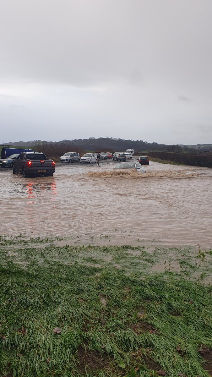 MonkeyManWales's tweet photo. @elonmusk @Tesla I didn't realise you made submarines as well. 😳 Next James bond car maybe? Local flooding in my village in Wales and a driver just sending it. https://t.co/f7qyafnzy1
