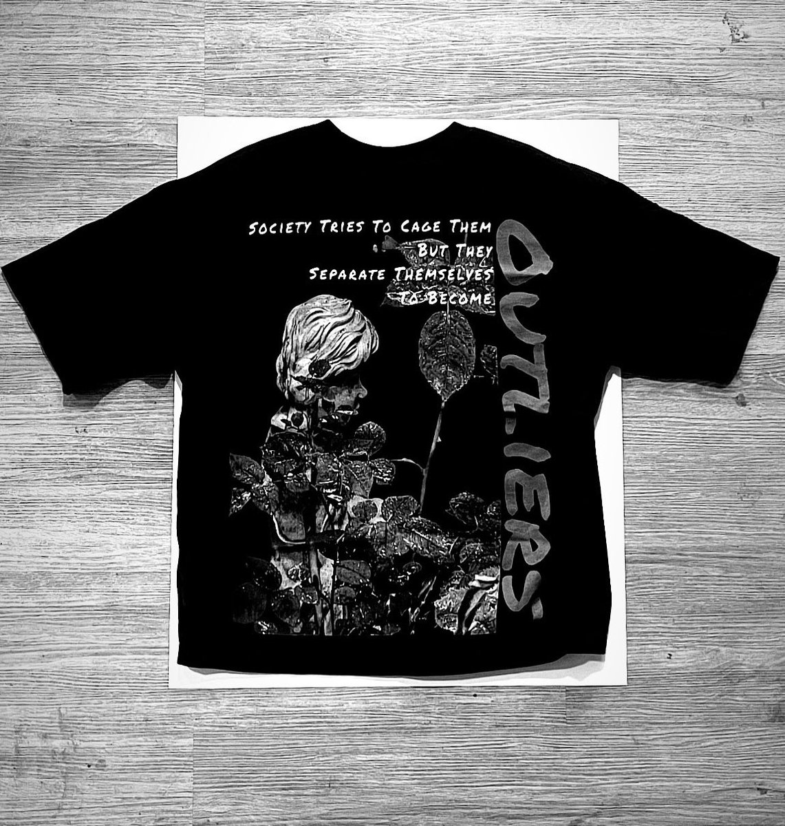 White Statue Tees available in the Cleveland area. Also can be ordered online at outlierome.com