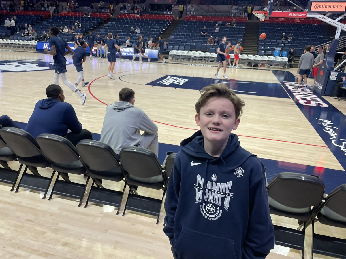 Innovate2Lead's tweet photo. My boy Caleb at his first @UConnHuskies  MBB game ! Let’s gooo.  And his sister Mads in the student section !

#BleedBlue https://t.co/eLdjot3Wi5