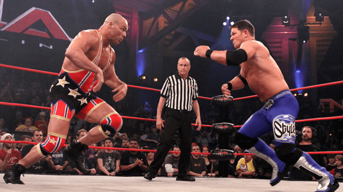 Studio1Sports's tweet photo. On the next #TAP: @RealKurtAngle will discuss Genesis 2010 with @PaulyBWell!
@HulkHogan & @EBischoff have joined the company along with Ric Flair. Kurt & AJ Styles square off!
What did Kurt think of Hulk & Eric coming in & the changes made?
Leave your questions below! #AskKurt https://t.co/KbbLoPZPjr