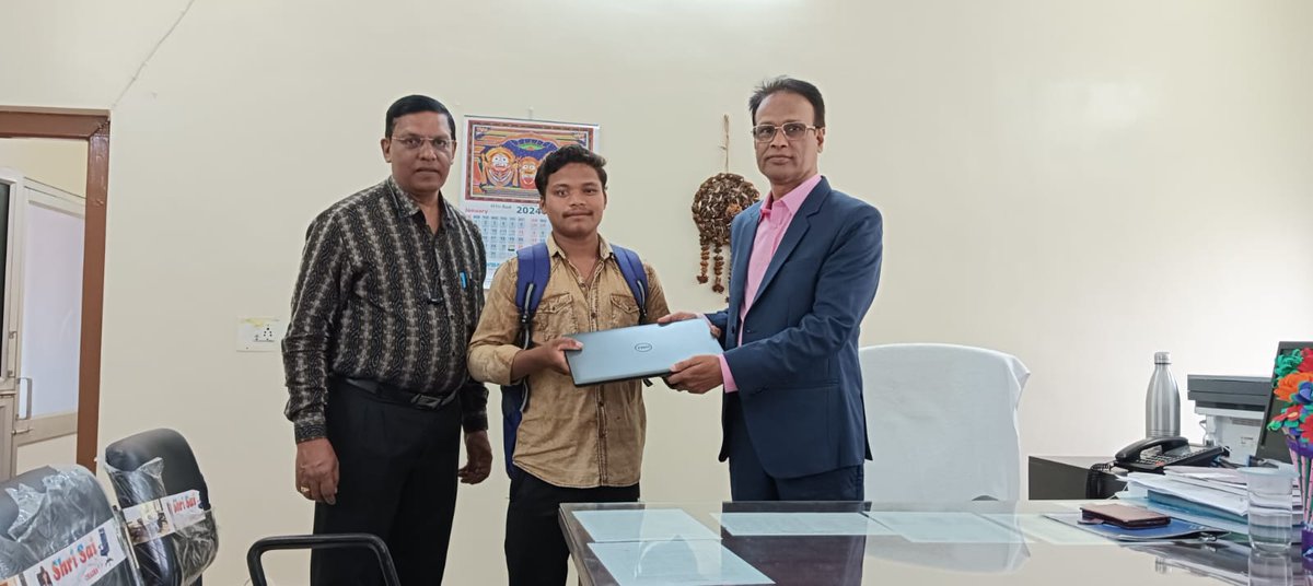 Laptop distributed to  VI students by ADM, Puri