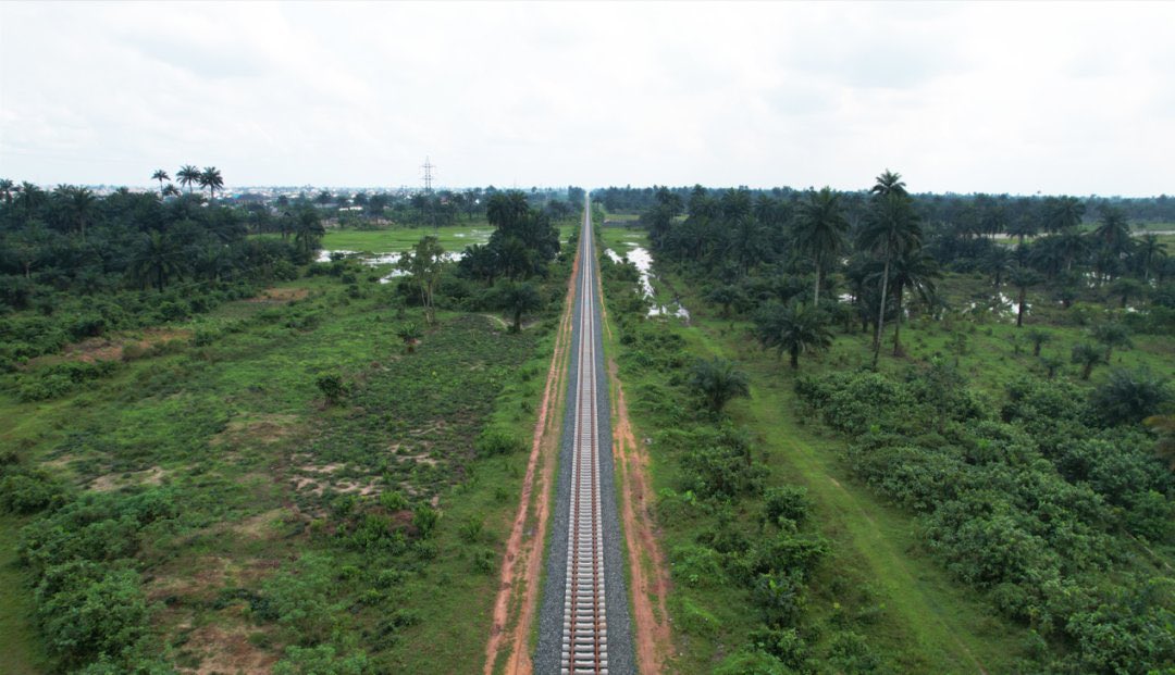 BashirAhmaad's tweet photo. So excited to have read the news that the rail track installation from Port Harcourt to Aba on the Nigeria Eastern Narrow-Gauge Railway (Port Harcourt—Maiduguri narrow gauge railway) project has been completed by @CCECC8. In March 2021, former President Muhammadu Buhari flagged off the commencement of this crucial and major infrastructure development that includes new branch lines, the Bonny Deep Sea Port, and a Railway Industrial Park in Port Harcourt, Rivers State.