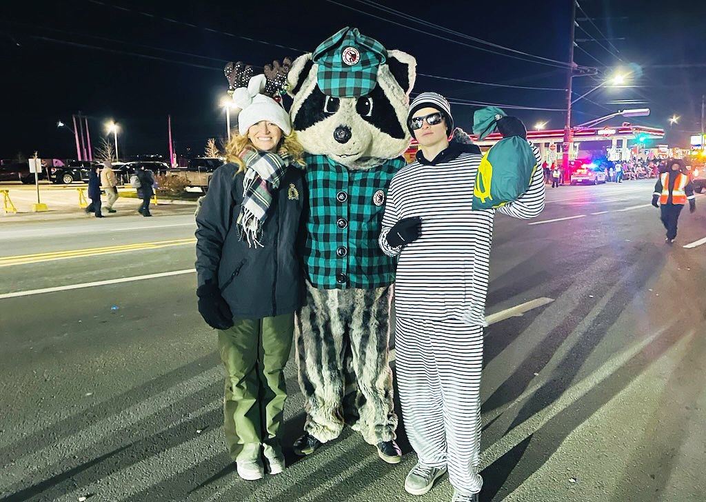 NBCrimeStoppers's tweet photo. Supporter Heather Morris, an employee with RCMP Victim Services at Codiac Detachment, convinced her son Weston Long to be Mr. Tips Mascot and son Cooper Long to be the Bank Robber at the annual Greater Moncton Santa Claus Parade held on November 25, 2023. Thanks for your support! https://t.co/MKSGwPgnAt