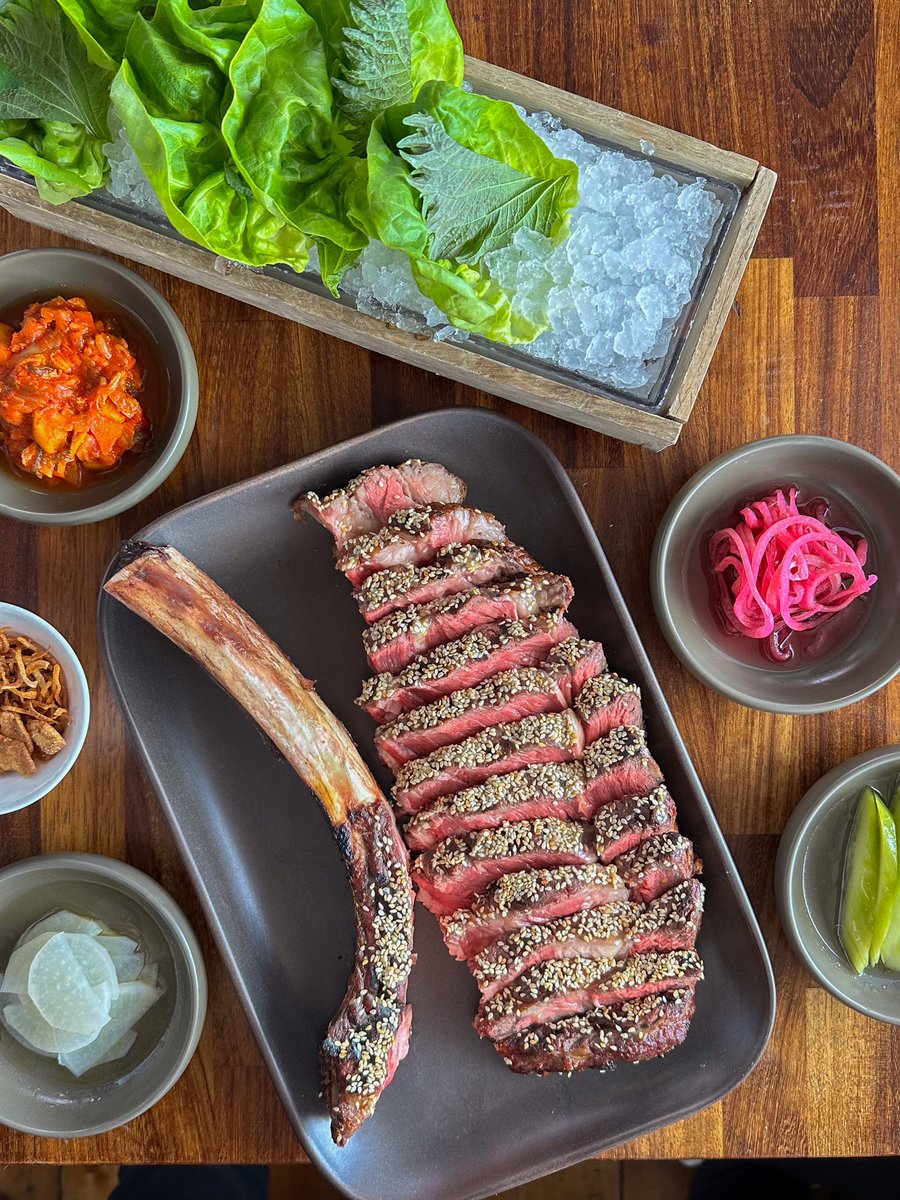 rusticdublin's tweet photo. Rib of beef for two with our recommended garnish of:
crisp lettuce parcels, bright pickled vegetables, cucumber, lettuce kimchi, spring onion, soft herbs, crunchy garlic & shallot.
#rusticstone #stonecooking #restaurantdublin #restaurant #dublin #dineindublin #foodandwine https://t.co/1gP5yjp4Mb