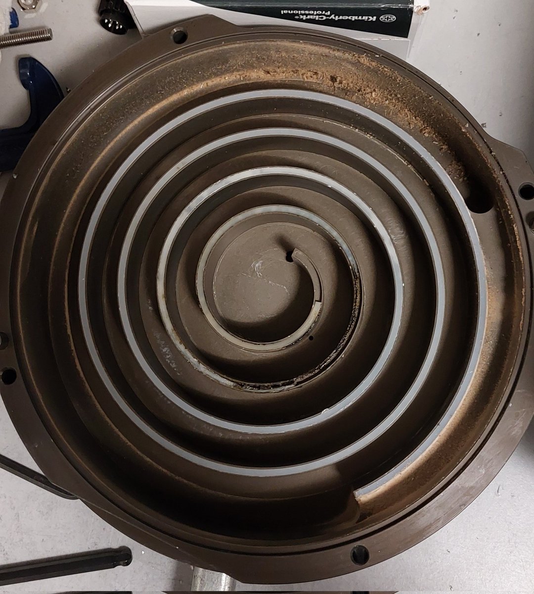 This is the inside of an <a href="/Agilent/">Agilent Technologies</a> scroll pump. These pumps help us achieve the vacuum in our #experiment. It shouldn't look dusty like this but over time the seals wear out and need to be replaced as these can run for 24/7 for years. #physics #PhD #cleaning #technology #science