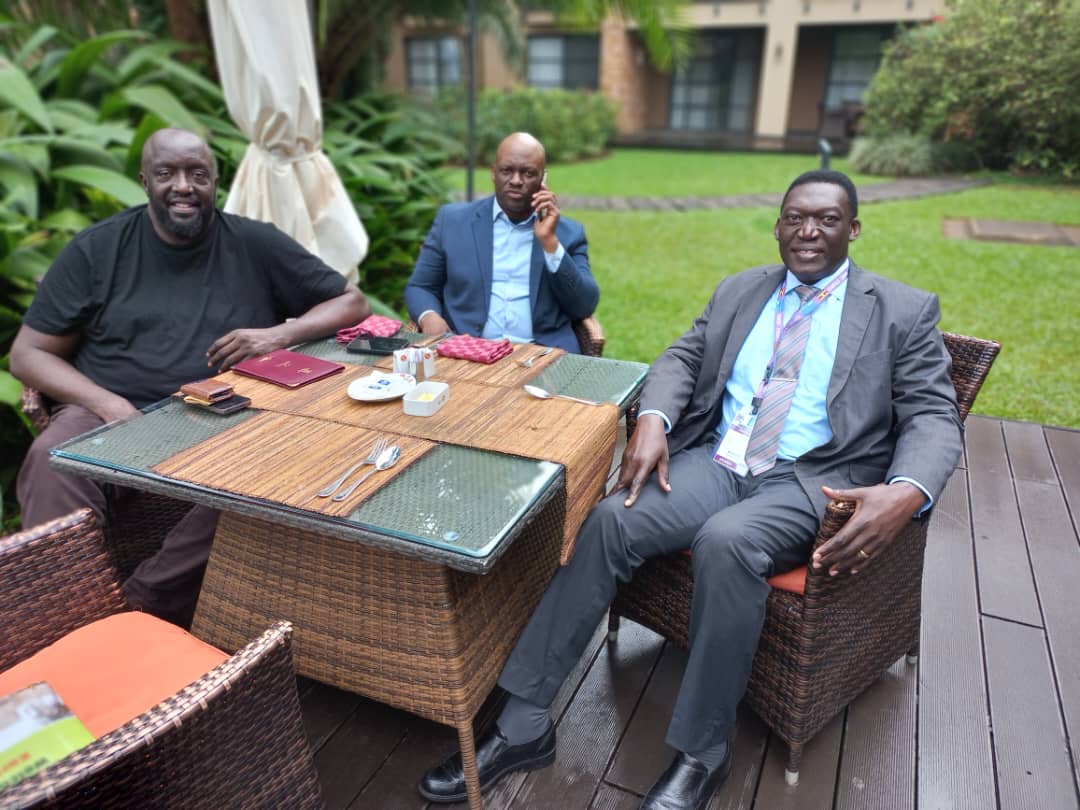 Three big men at a table, reminiscing about 30 years of friendship! Between @kasujja , @bobfitness6 and I, we could probably finish a whole cow.