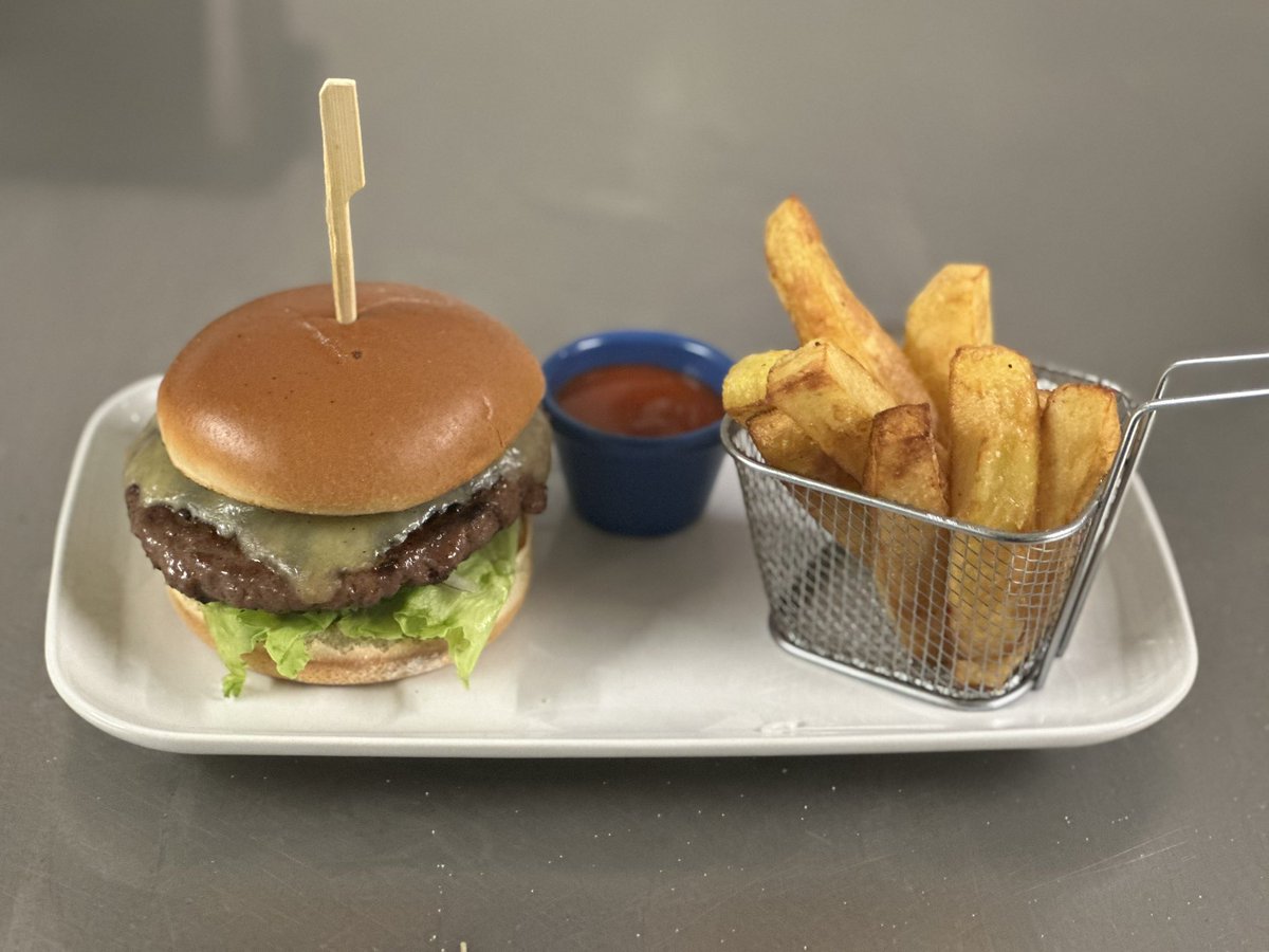 Bacon cheeseburger with a buffalo dipping sauce