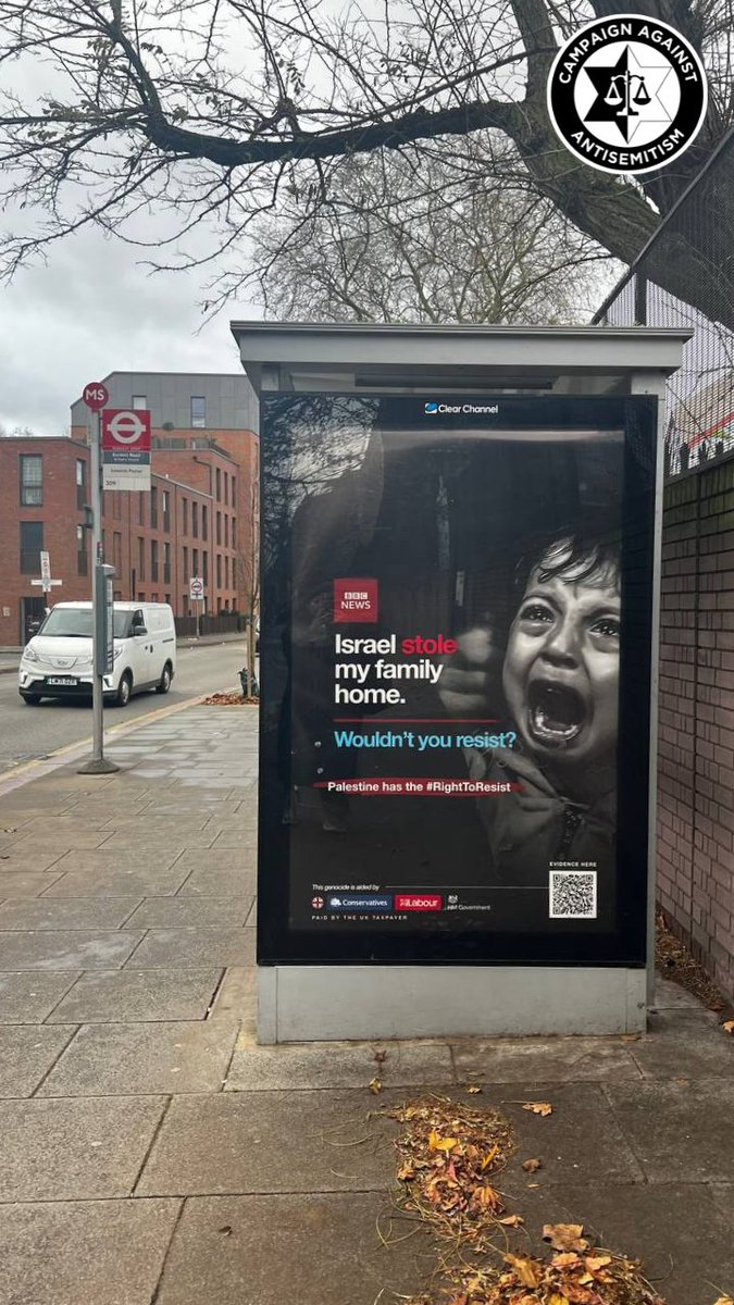 antisemitism's tweet photo. Why is this gross and illegal advert allowed to be displayed?

This is up for all to see in Mile End in East London. Sickening attempts to justify Hamas’ barbarism against Jews and Israelis have absolutely no place in Britain.

Almost half of British Jews have considered leaving the UK due to antisemitism since 7th October, according to our latest polling, and sinister propaganda such as this only emboldens those who hate Jews.

Last week we posted about a similar advertisement in Brick Lane and asked why @TfL does not insist that advertising companies put locks on their bus stop advertising hoardings? 

If the placement of these vile ads is to continue, then the question is even more pressing.