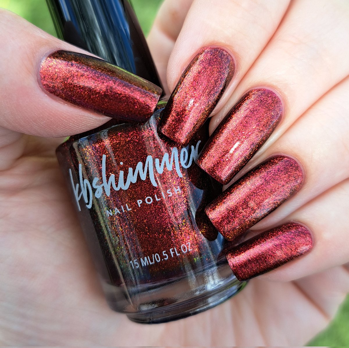 givemesparkles's tweet photo. This week's polish: 'Core Values' from @kbshimmer's It's Fall About You collection is a deep jewel-toned red shade that shifts into maroon tones and at extreme angles show gold and deep pink hues. A perfect red. 10/10. ✨️❤️💅 #kbshimmer #indienailpolish #givemesparkles https://t.co/wYQue3HXfg