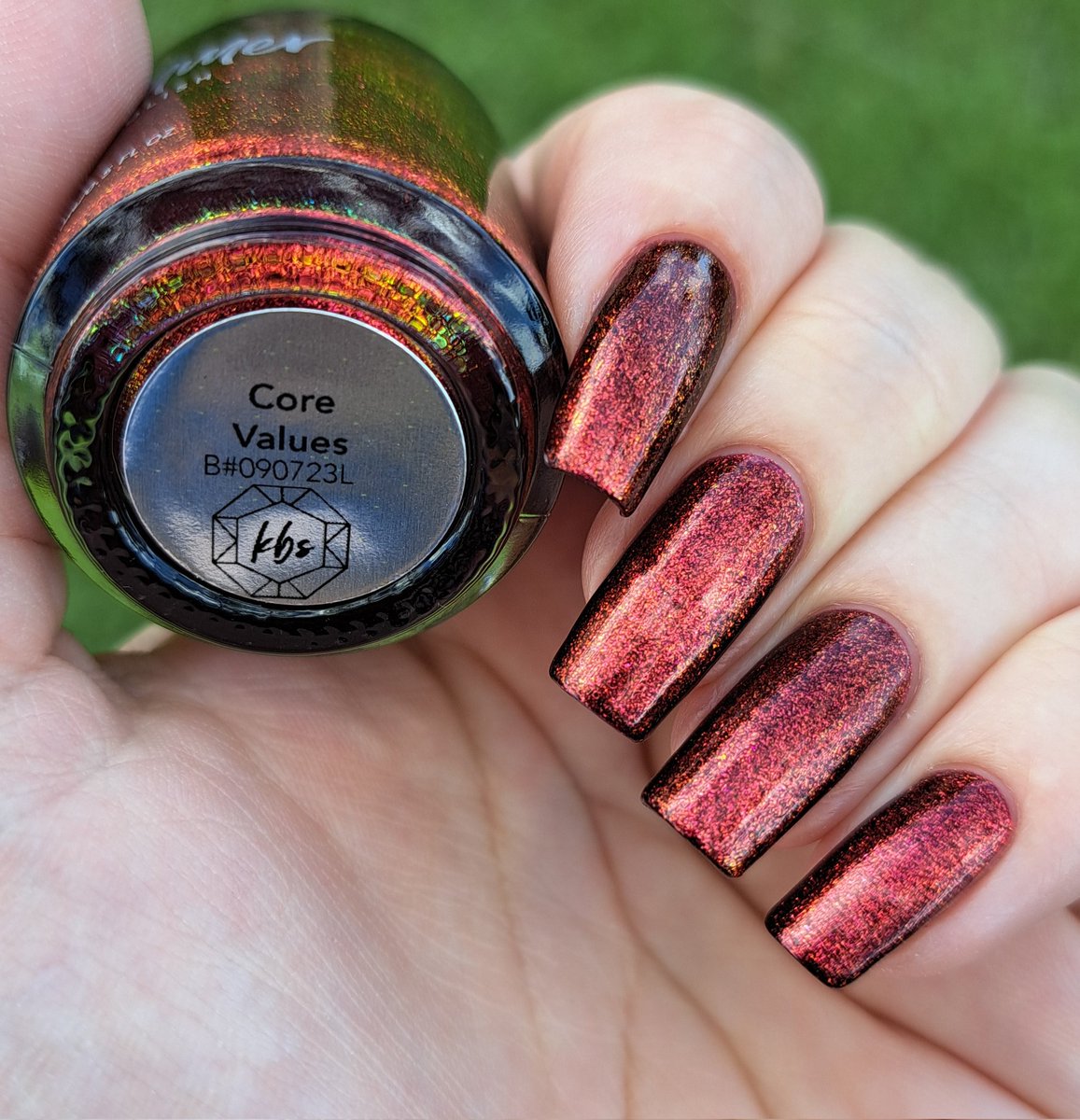 givemesparkles's tweet photo. This week's polish: 'Core Values' from @kbshimmer's It's Fall About You collection is a deep jewel-toned red shade that shifts into maroon tones and at extreme angles show gold and deep pink hues. A perfect red. 10/10. ✨️❤️💅 #kbshimmer #indienailpolish #givemesparkles https://t.co/wYQue3HXfg