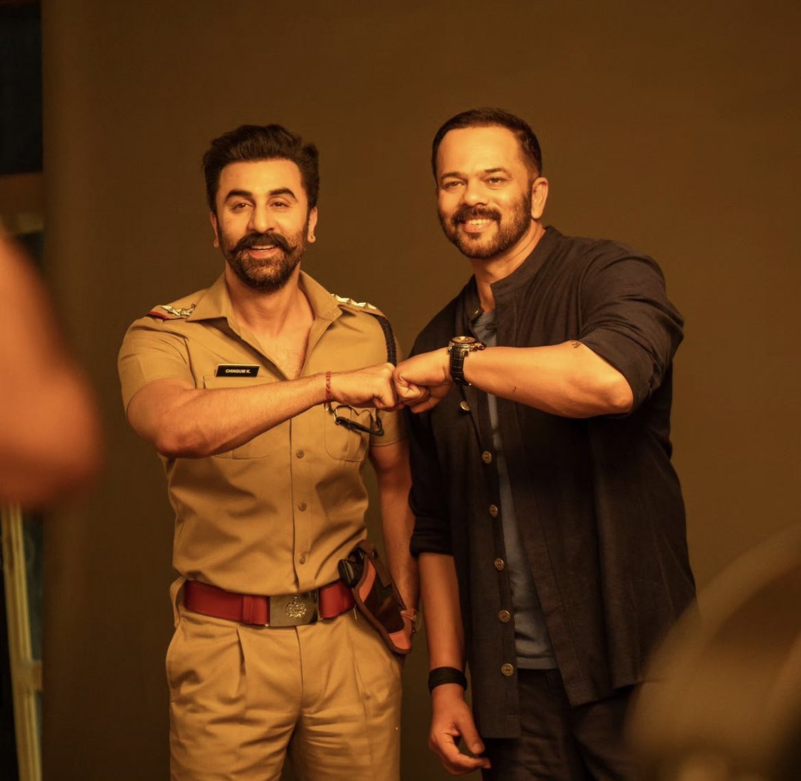 Binged_'s tweet photo. What's up with #RohitShetty and his #CopVerse ? 

#RanbirKapoor in a cameo?

Here's the reveal: The duo has collaborated for an ad! 😁 https://t.co/7La1E7HRJk