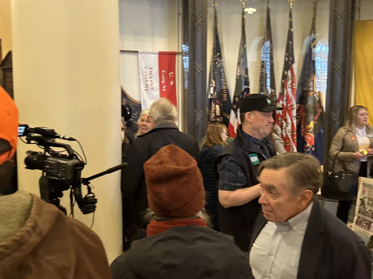 This is Mike Hein, who is wearing @bangordailynews gear and talking to protesters in the State House. He does not work for the BDN. #mepolitics