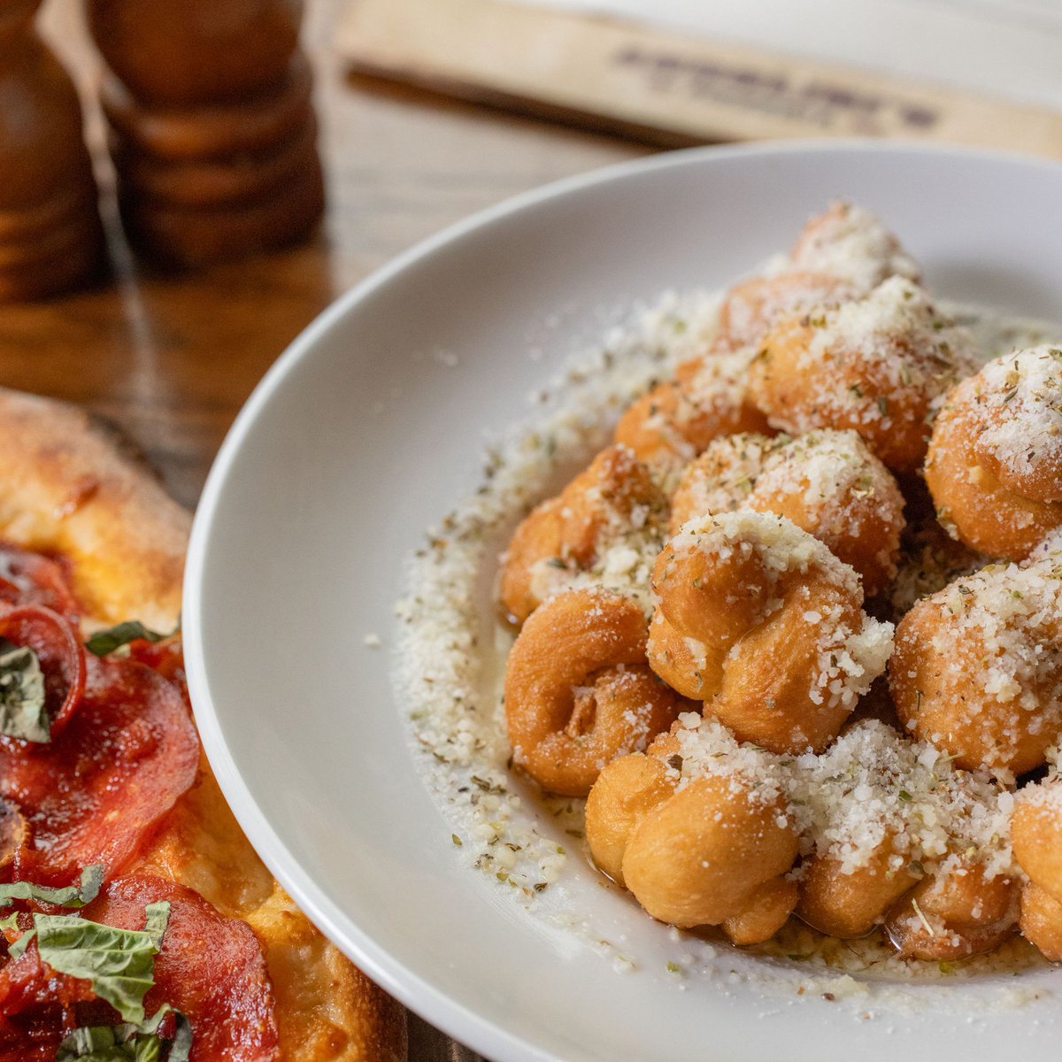 Indulge in the ultimate Italian feast! Dine in with us and receive a mouthwatering bonus of free garlic knots when you purchase any meal. Don't miss out on this delicious offer!

#ItalianFoodie #FreeGarlicKnots #DineInSpecial
#SavorTheFlavors #TemptingOffer