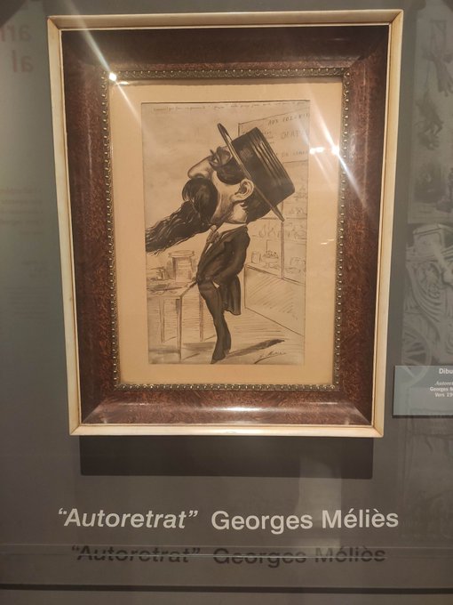 self portrait of Georges Mèliés, drawn using pencil. He's wearing a suit and a black hat, a long beard and is looking at the sky.