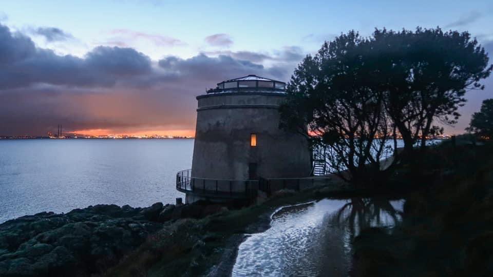 AnnBruen's tweet photo. Love this #photomemory from #thisday2021. The evening light was shining through the Martello Tower on the Sutton side of the Howth Cliff Walk
#lovindublin #visitdublin #howthcliffwalk #suttonmartellotower #icu_ireland #addicted_to_ireland #discoverireland https://t.co/9qGcIVTUkQ