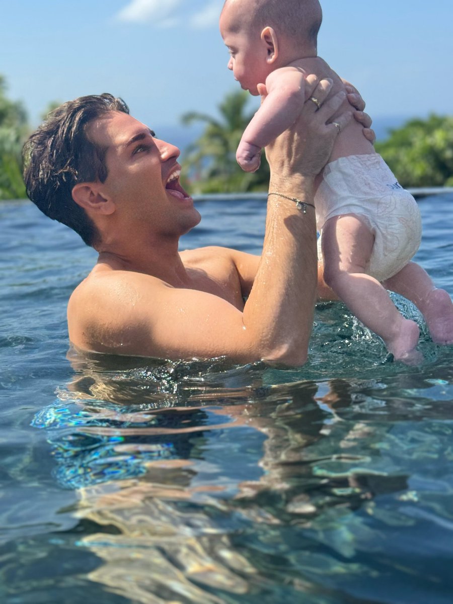 My whole heart! Love like I have never felt! The babies first swim #barbados