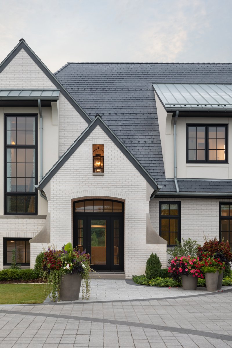 Positioned atop a hill in a quaint Wisconsin village, the Modern European Residence is inspired by old-world European masonry farmhouses.

#residentialarchitecture #milwaukeearchitecture #moderneuropean #masonryhouse #brickhouse #transitionalstyle #oldworld #wisconsin #firebrick