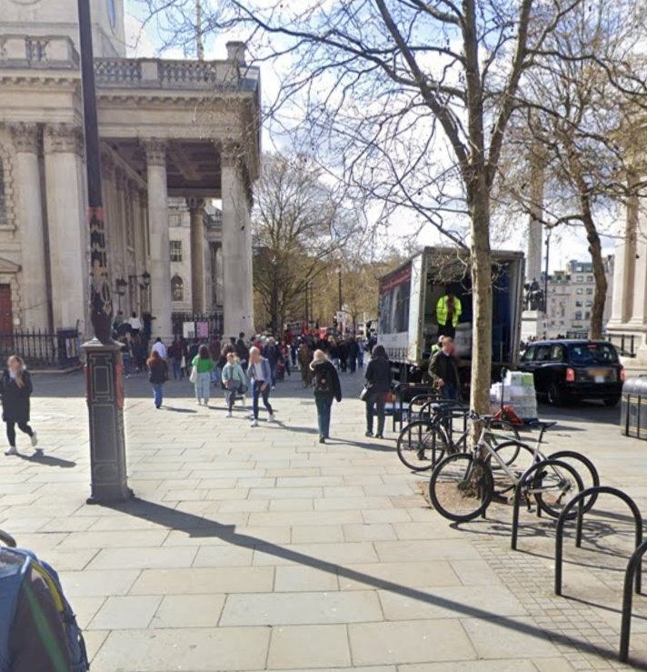 Knowledgepoint's tweet photo. Then &amp; Now: St Martin's Place
A rainy day in London, 30 January 1902, with Hansom cab and pedestrians with umbrellas. Now a sunny Day over 120 years in the future with St Martin's-in-the-Fields looking cleaner with a few trees and cycles parked up. https://t.co/THvG3S8Qvj