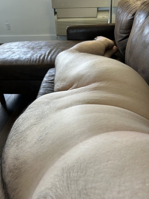 Lounging lazily on the hotel suite's super comfy living room couch, basking and showing off my ASSets