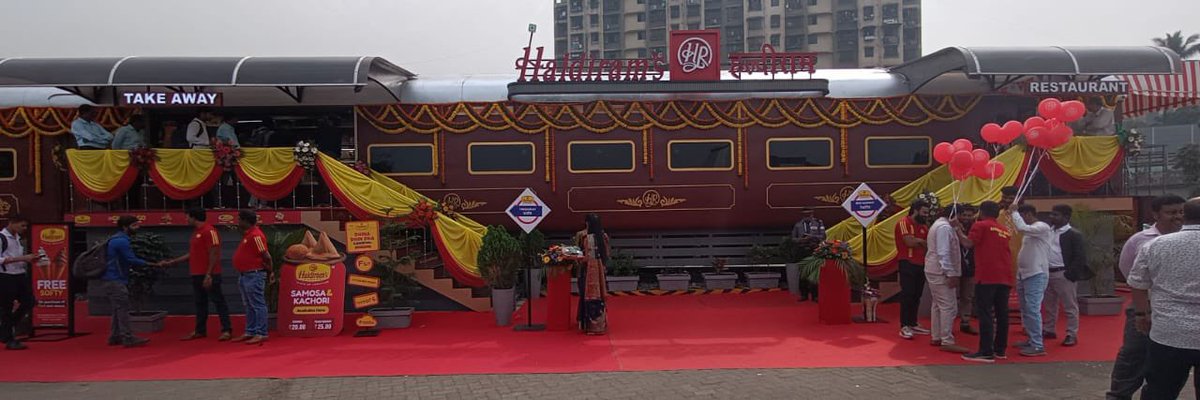 "Indulge in a feast for your senses! 🍽️🚂 Haldiram has arrived at Lokmanya Tilak Terminus, Mumbai division. Take a culinary detour with us as we serve up irresistible delights aboard our new Rail Coach Restaurant. From savory snacks to delightful desserts.