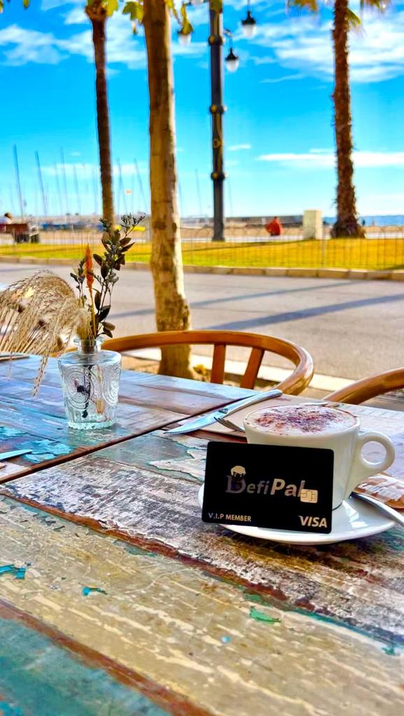 defiPal_inc's tweet photo. Wish you all a beautiful weekend. Here's one of our first cutomer enjoying his coffee bought with #DefiPal card. https://t.co/W7fcahxOU2