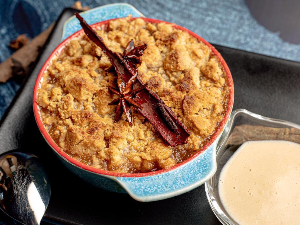 JNM_8's tweet photo. Delight in the heartwarming delight of our exquisite Apple Crumble! Savor the perfect blend of cinnamon-kissed apples topped with a crispy, buttery crumble – a heavenly treat to share with your loved ones this festive season!🎁✨

Reserve your table today 0794 583 771. 📞 https://t.co/XYSeLrzr5O