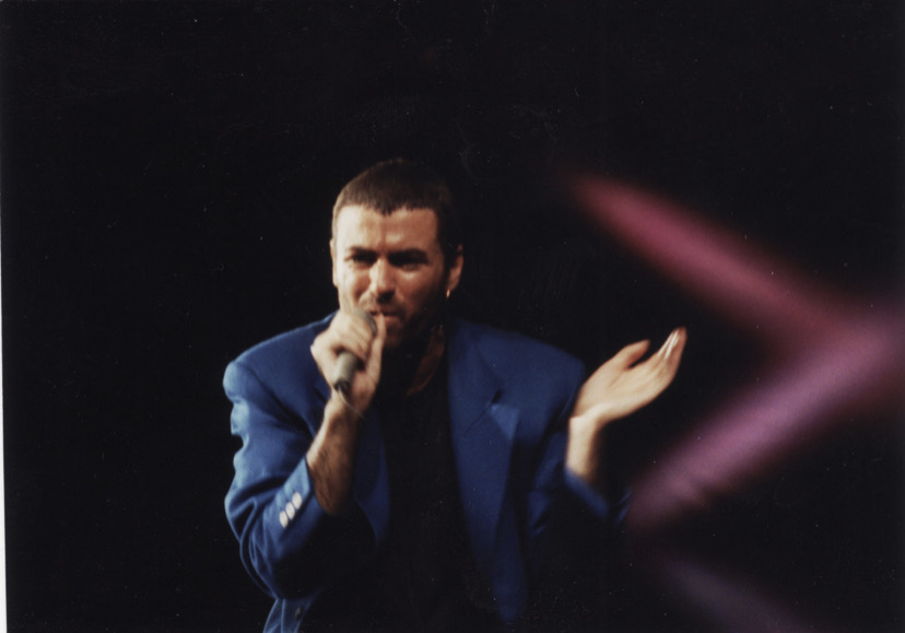 George Michael wearing his beautiful blue jacket during ‘Cover To Cover Tour’ in 1991.
