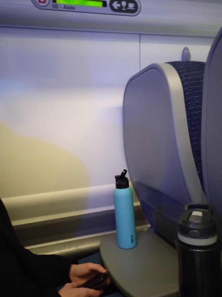 Bevromancer's tweet image. What kind of diseased mind could conceive of a train seat without a window?