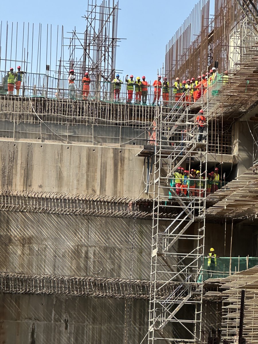 TayeAtske's tweet photo. Clouds are hovering above, The Gibe river is flowing through the majestic mountains of South West Ethiopia; thousands skilled workers and engineers are moving the earth building the Koyesha Hydro-Electric Dam, another Engineering marvel of #Ethiopia. There shall soon be light to our people in the South.Hope,perseverance and courage are moving Ethiopia forward.