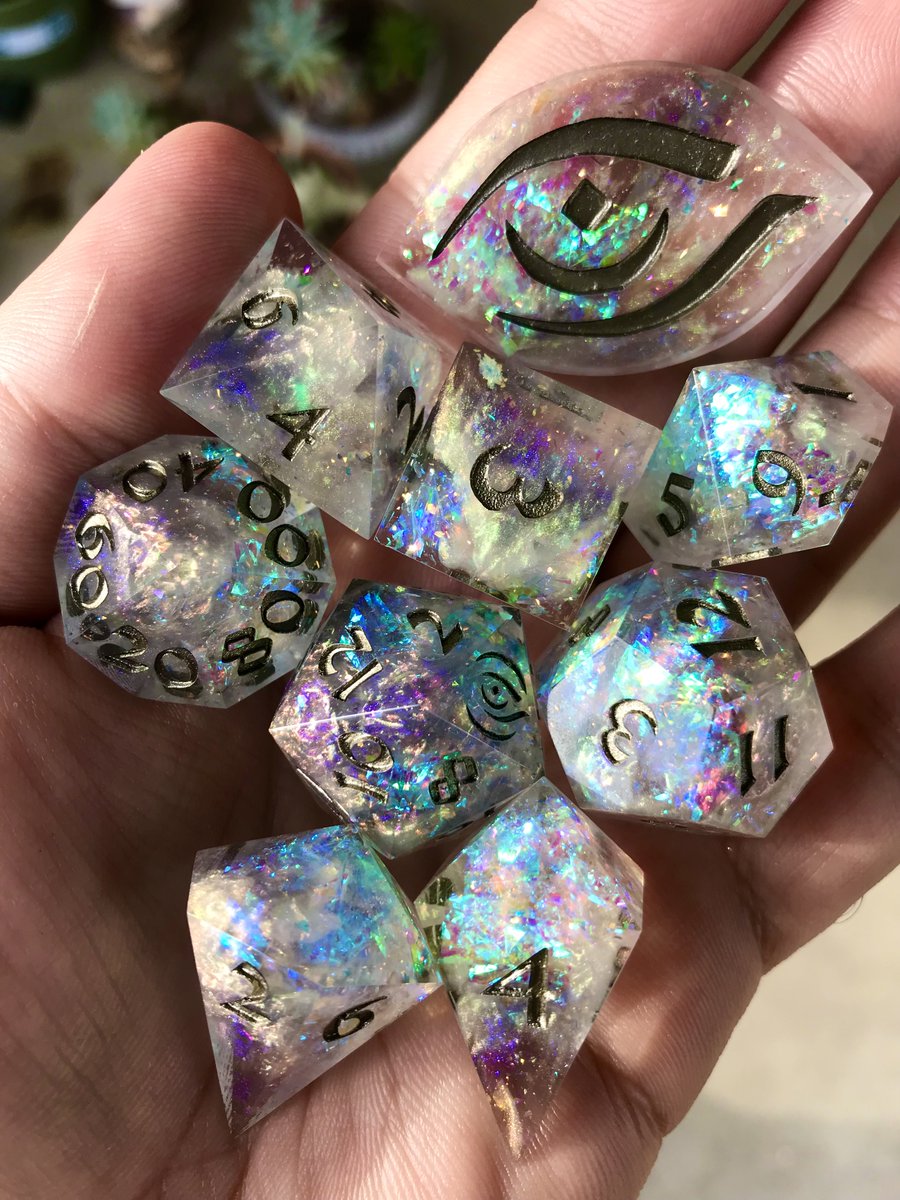 moondjinn (@themoondjinn) on Twitter photo time for a #giveaway 🏆
to mark the coming of Sword of Souls 5E ⚔️
enter to win this 9-pc #handmade diceset 👀
opal, swirling glitter, & pale bronze ink 💎
rules:
- like & retweet this post
- follow <a href="/swordofsoulsRPG/">SWORD OF SOULS</a>
- comment your favorite 5E subclass
winner chosen 12/30 ⚔️ time for a #giveaway 🏆
to mark the coming of Sword of Souls 5E ⚔️
enter to win this 9-pc #handmade diceset 👀
opal, swirling glitter, & pale bronze ink 💎
rules:
- like & retweet this post
- follow <a href="/swordofsoulsRPG/">SWORD OF SOULS</a>
- comment your favorite 5E subclass
winner chosen 12/30 ⚔️