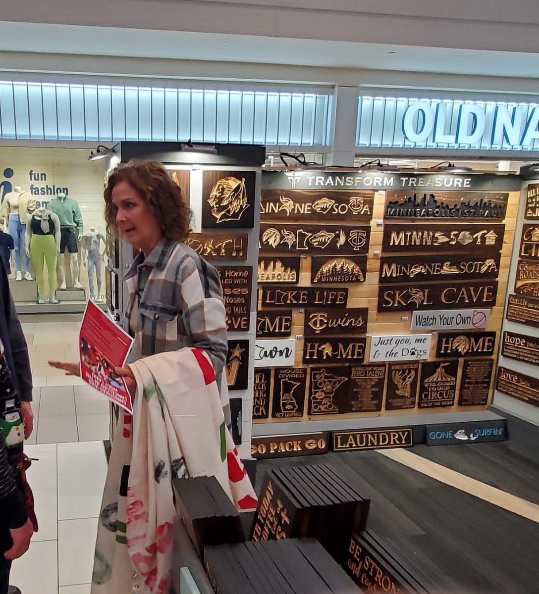 asmaresists's tweet photo. This woman stole a banner at Ridgedale Mall in MN today that read, “Christmas canceled in Bethlehem. 20,000+ murdered in Gaza. Ceasefire now!” What could motivate someone to hate Palestinians so deeply? Give back our banner! https://t.co/kjbK4xKweS