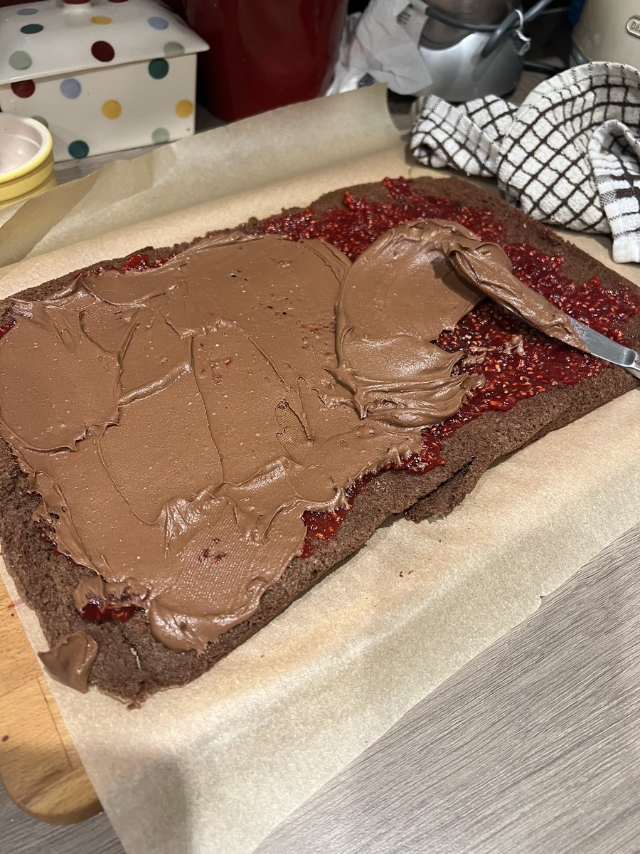 _Plummy_'s tweet photo. Made at attempt at @Nigella_Lawson’s Yule Log. The child insisted on the addition of some homemade raspberry jam (sorry, Nigella), but I don’t think it turned out too bad. Think it will be a festive staple! 🪵 https://t.co/kMP0YzA6WB