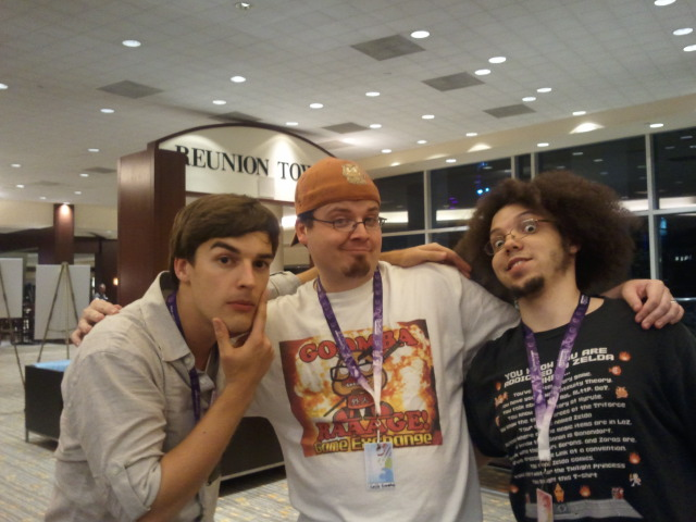 fake_convos's tweet photo. This now iconic photo of Youtuber MatPat (left) and his friends was taken in June 2013 at the Hyatt Regency Hotel in Dallas, Texas. MatPat went on to cut himself out of the photo and use it to visually represent himself in his YouTube videos, where most would recognise it from. https://t.co/wW3OTbbaRc