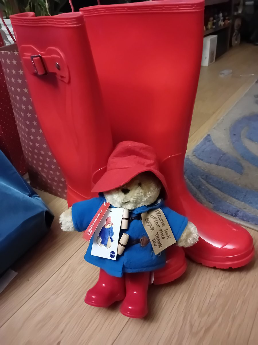 CJ_Colbourn's tweet photo. When I was young my dad stole the wellington boots off my @paddingtonbear to give to my sister.  Finally 30 odd years later he has redeemed himself. 
#Paddingtonbear #Christmas2023 #redwellies https://t.co/l00ITdaknk