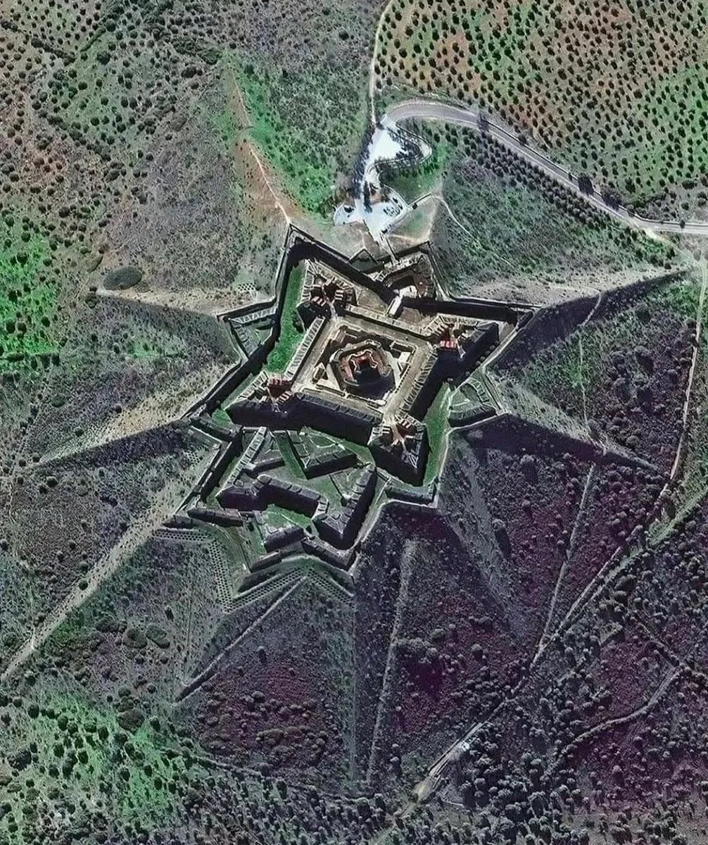 Looming high over the arid countryside, approximately 3km north of town ...