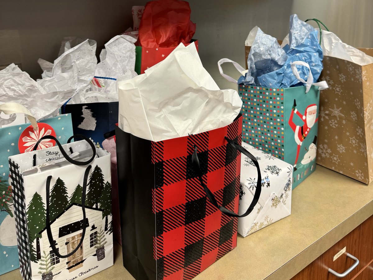 AdamSKutner's tweet photo. There are normal days in the office, and then there are PJ days with a white elephant gift exchange &amp; a very special four-legged guest! PJ day is one of our favorite annual holiday traditions. What's yours? 👇

#PJDay #HappyHolidays #TisTheSeason #DogsInClothes https://t.co/Nb2SDo4HY2