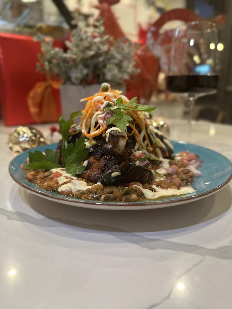Let's gather, feast, and embrace in the spirit of Kwanzaa together. From Dec 26-Jan 1, savor in the rich heritage of the Black community with our special: Jerk Chicken, black-eyed peas, collard greens, pickled coleslaw, garlic lemon aioli, and vibrant pico de gallo. Reserve today