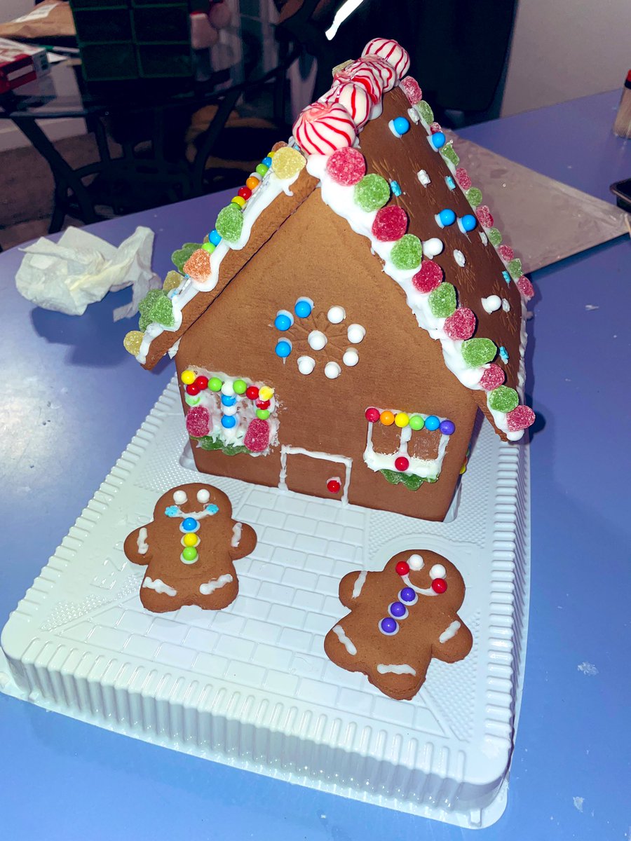 zoeytruran's tweet image. made a gingerbread house with @Ehbit_, guess which person decorated which side