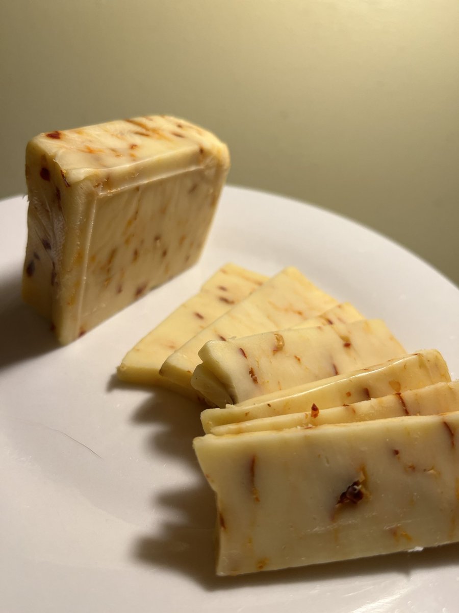 zacdevries's tweet photo. Welcome back to #12DaysOfCheese with de Vries!
For the 11th day of #Cheesemas we have Hot Jill from Little Qualicum Cheeseworks!
Jill is a Monterey Jack’s better half; mild, young, and smooth! This one has a little kick of spice from red chilis!
Perfect addition to any board! https://t.co/evVxAgFLbu