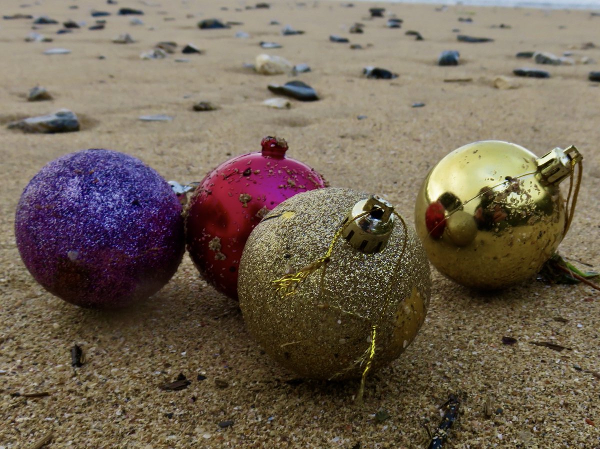 Remnants of Christmas past. Festive baubles found washed up on Cornish beaches.