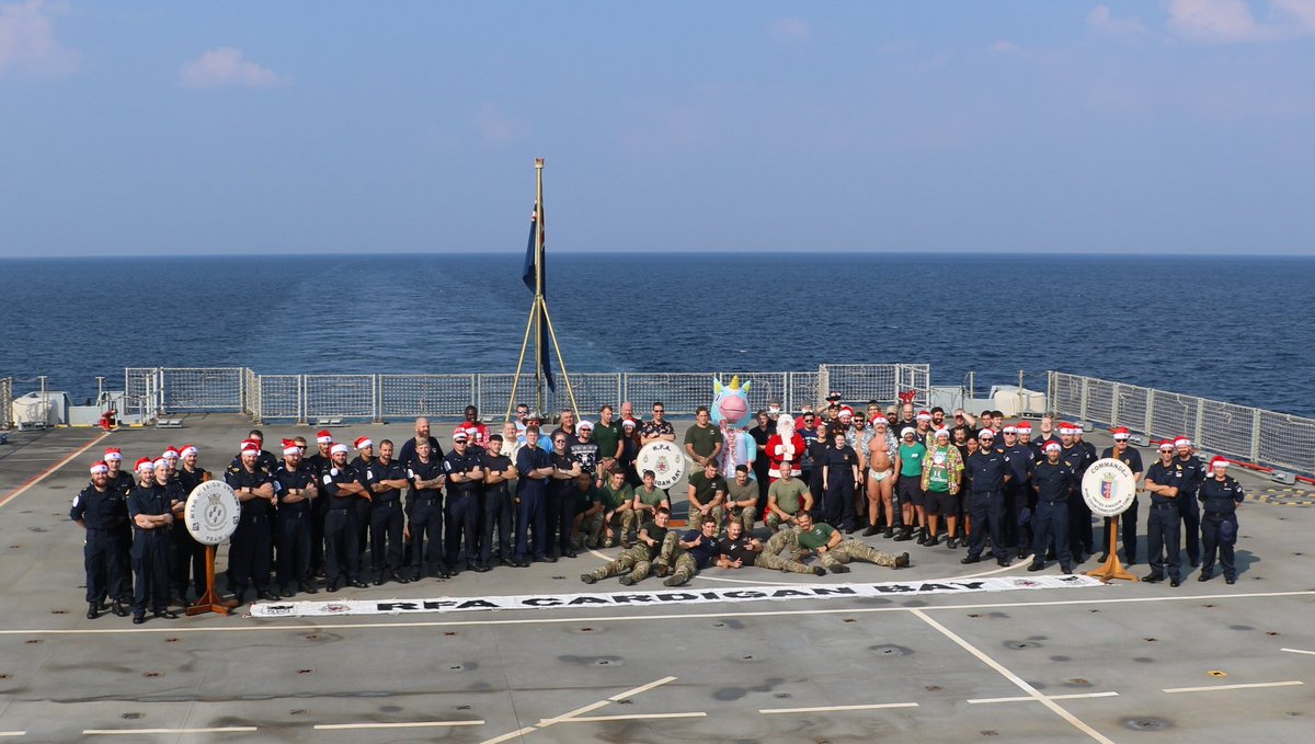 At sea and deployed in the Middle East, personnel on RFA Cardigan Bay gather together to say, from our family to yours, Merry Christmas.